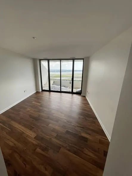 Hardwood plank installation finished in a high-rise condominium with river views